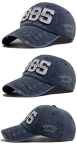 Detail of 1985 embroidered distressed denim baseball cap with vintage worn-out finish