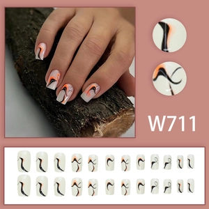 Abstract orange and black wave pattern press-on nails in medium-long length, 24pcs set