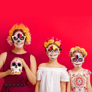 Day of the Dead sugar skull masks and flower headbands for women and kids on red background