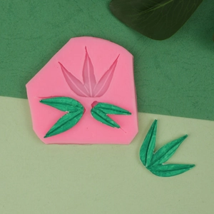 Detailed pink silicone mold for DIY bamboo leaf fondant with clear leaf vein textures