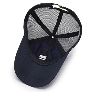 Inside view of a dark blue breathable mesh baseball cap with adjustable metal buckle strap