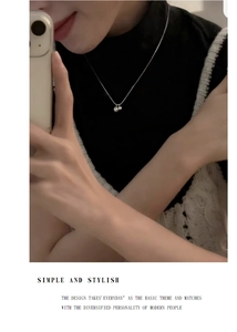 Close-up of s925 silver double bead pendant necklace with a natural freshwater pearl