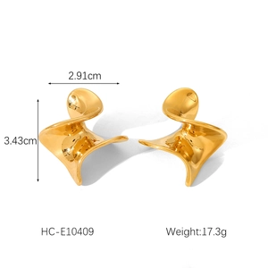 Detail view of gold irregular twist earrings with dimensions 3.43cm by 2.91cm