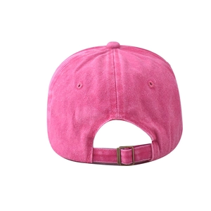 Rear view of washed pink baseball cap showing adjustable strap and antique bronze metal buckle