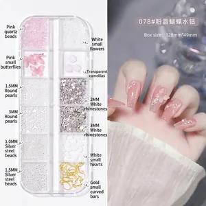 Pink crystal butterfly nail art set with mixed pearls and charms in 12-grid storage box