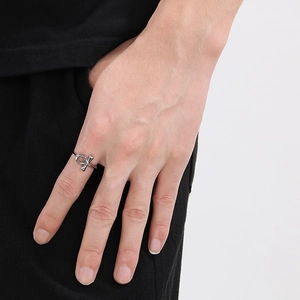 On-hand view of vintage stainless steel Ankh cross ring for men with polished silver finish