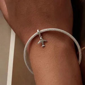 Minimalist S925 sterling silver mesh bracelet with a tiny airplane charm for women