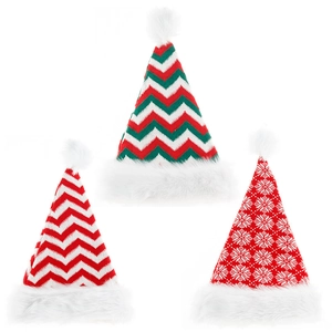 Three knitted Christmas hats with red and green stripes and snowflake patterns