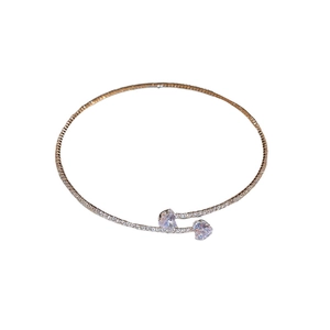 Rose gold double heart zircon bangle featuring shimmering pavé set crystal accents