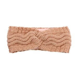 Detail of warm knit headband featuring camel wavy weave and pink fleece lining texture