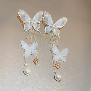 Lace butterfly tassel earrings with white pearls and gold chains in elegant vintage style