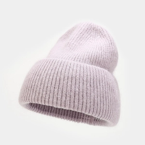 Close-up of thick light purple ribbed knit beanie showing soft wool texture and wide cuff