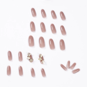 Deep pink almond press-on nails set with elegant 3D gold butterfly charms on white background