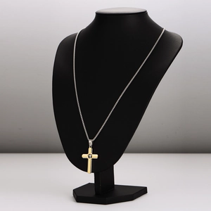 Fashionable stainless steel necklace with a dual-tone cross pendant on a neck mannequin
