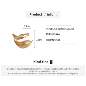 Detail showing matte gold wavy leaf cuff bracelet with product dimensions and alloy specs