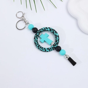 Silicone turquoise leopard print cross car pendant with black tassel and silver clasp