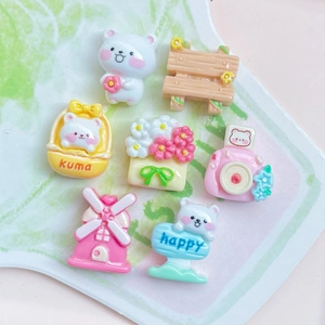 Detailed set of 7 mini resin accessories featuring bears, flowers, and a camera for DIY crafts