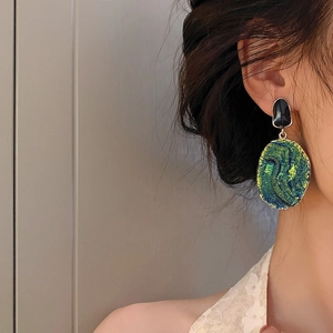 Retro blue-green oil painting style oval earrings with artistic gold shimmer and black stud