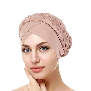 Detail of twisted braid design on elastic dusty pink muslim turban headwrap for women