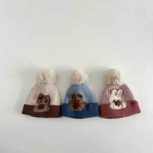 Three-piece baby winter knit hat set featuring 3D animal jacquard patterns and pom-poms