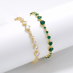 Elegant gold-plated bracelet with white and green sparkling round-cut crystals