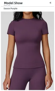 Front view of plum purple quick-dry yoga t-shirt and high-stretch fitness leggings