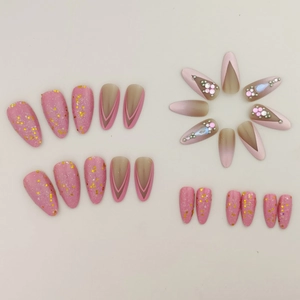 Pink almond press-on nails with glitter accents, french tips and rhinestones