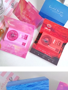 Flat lay of artistic phonograph greeting cards with romantic English inscriptions