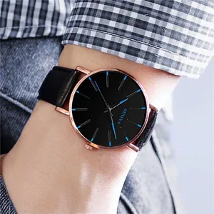 Minimalist Geneva men's quartz watch with black dial and rose gold case on leather strap