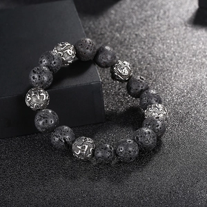 Tiger eye stone and black lava bead bracelet with engraved silver mantras on display box