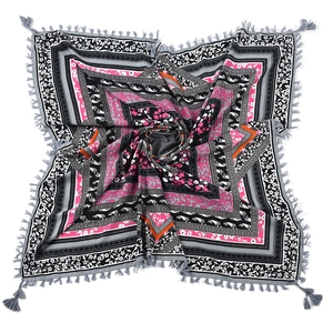 Detailed view of bohemian square scarf with paisley floral pattern and grey fringes