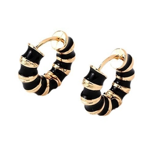 Bamboo style hoop earrings in gold metal with black enamel finish for women