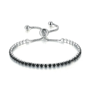 Macro shot of adjustable sliding clasp on tennis bracelet with black square-cut zircons