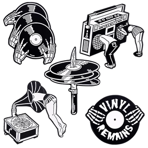 Vintage retro radio cassette and skull vinyl enamel pins set in black and white