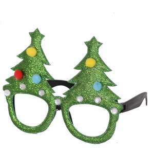 Detailed view of Christmas tree glasses with colorful pom-poms and sparkling glitters