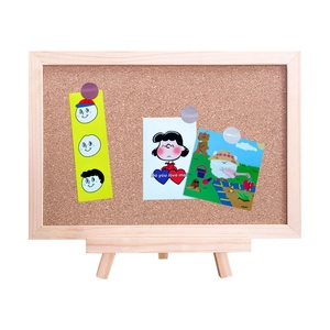 Framed cork bulletin board with wooden stand and decorative notes on white background
