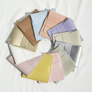 Detailed top view of colorful PU leather jewelry gift pouches in a circular layout