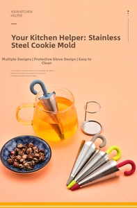 Macro detail of umbrella-shaped tea infusers with colorful silicone handles and steel mesh