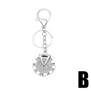 Porte-clés étoile argenté avec cadran à chiffres romains et strass blancs brillants