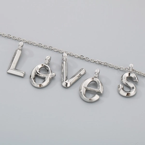 Silver stainless steel LOVES letter pendant necklace with sparkling crystal accents