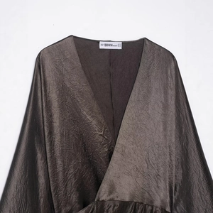 Elegant deep V-neck bronze satin dress with metallic pleats and cinched waist for women
