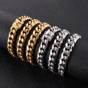 Cuban link necklaces in gold and silver finish with CNC stones on black background