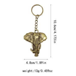 Vintage bronze elephant head keychain with dimensions and weight in white background