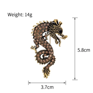 Detailed size view of vintage enamel dragon brooch with champagne crystals, 5.8cm height