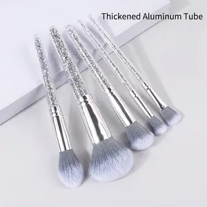 5-piece makeup brush set with silver glitter handles and purple gradient bristles