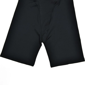 Detailed view of black slim-fit bodysuit with zipper and smooth elastic fabric