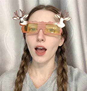 Front view of model wearing cartoon reindeer Christmas party glasses with brown frame