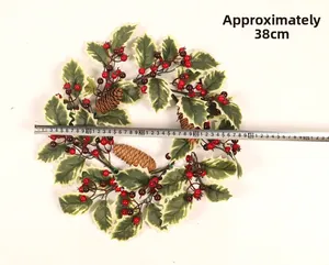 Detail showing Christmas wreath with pine cones and berries, measuring approx. 38cm wide