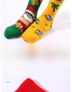 Calze di Natale con stampa Babbo Natale, polsini elastici e motivi colorati