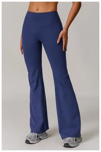 Detailed close-up of dark blue high-waisted flared yoga pants with seamless waistband